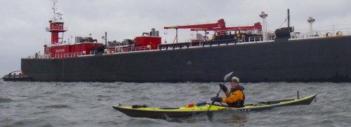 Kayak porn: Johna posing with barge