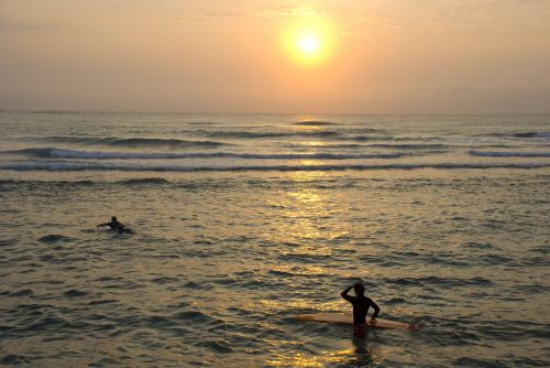 Paddling out at dawn