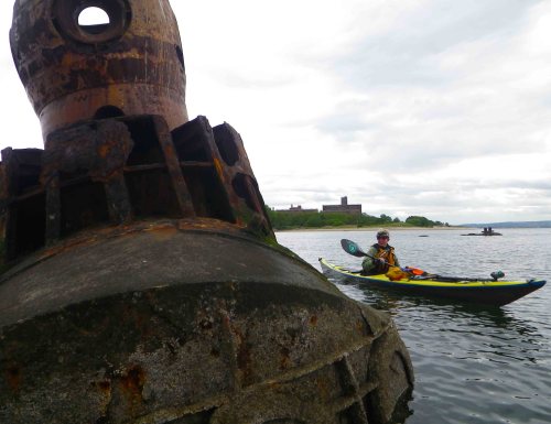 Rusted and barnacle-encrusted