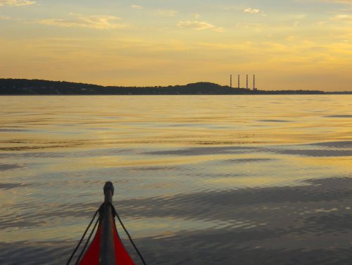 Four powerplant smokestacks guide us