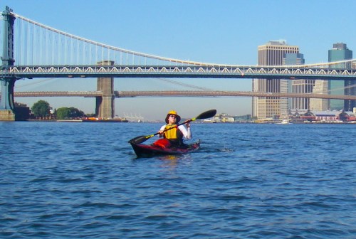 vlad-smiling-with-paddles-and-bridge